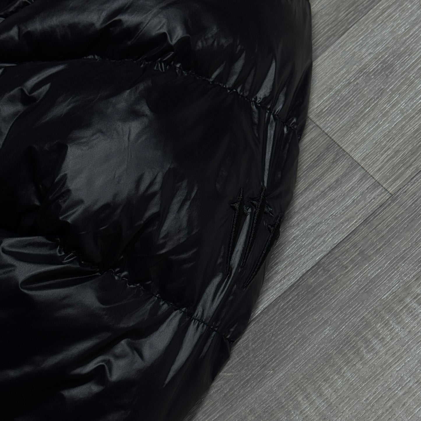 NIKE NOCTA GLOSSY PUFFER JACKET BLACK