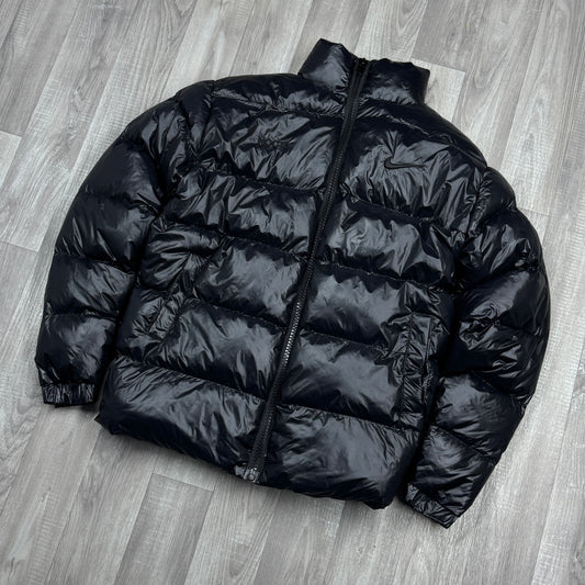 NIKE NOCTA GLOSSY PUFFER JACKET BLACK